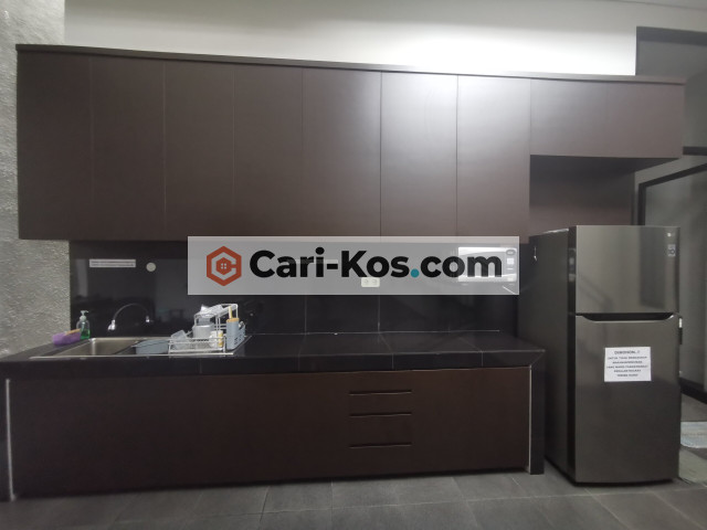 kost exclusive dengan parkir luas dan rooftop garden