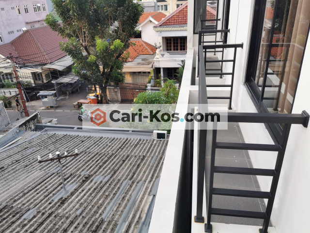 kost exclusive dengan parkir luas dan rooftop garden